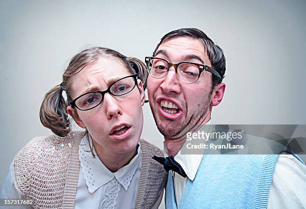 confused nerd young man and woman - ugly woman stock pictures, royalty-free photos & images