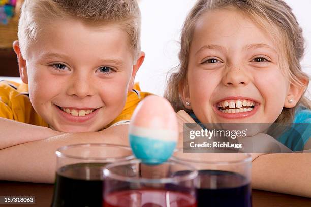 easter series - kid boiled egg stock pictures, royalty-free photos & images