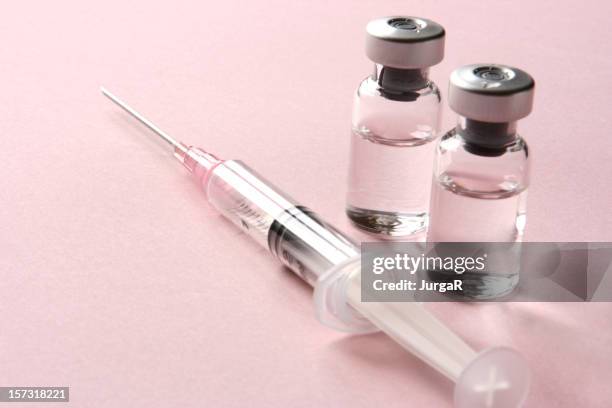 vaccination: syringe and vials with medicine - injection stock pictures, royalty-free photos & images