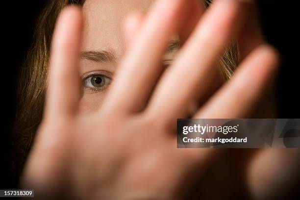 stay away! - hands in the face stock pictures, royalty-free photos & images