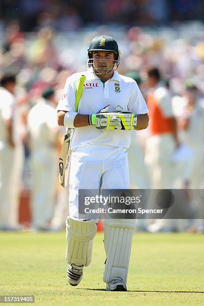 Dean Elgar of South Africa walks off the field after being dismissed by Mitchell Johnson of Australia for lbw during day three of the Third Test...