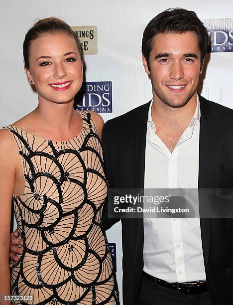 Actors Emily VanCamp and Joshua Bowman attend Mending Kids International's "Four Kings & An Ace" Celebrity Poker Tournament at The London Hotel on...