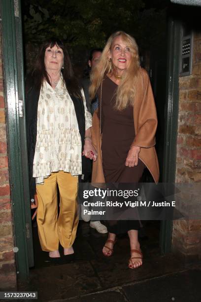 Anjelica Huston and Jerry Hall seen attending Mick Jagger's 80th birthday party at his house on July 26, 2023 in London, England.