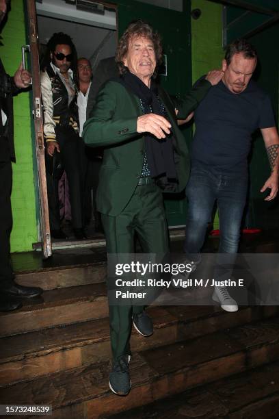 Lenny Kravitz and Mick Jagger seen leaving Mick Jagger's 80th birthday party at Embargo Republica nightclub in Chelsea on July 26, 2023 in London,...