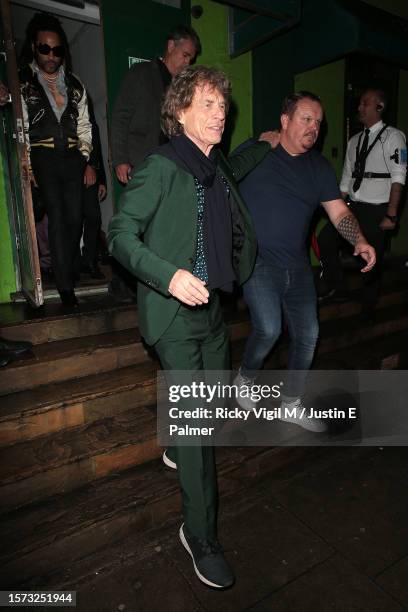 Lenny Kravitz and Mick Jagger seen leaving Mick Jagger's 80th birthday party at Embargo Republica nightclub in Chelsea on July 26, 2023 in London,...