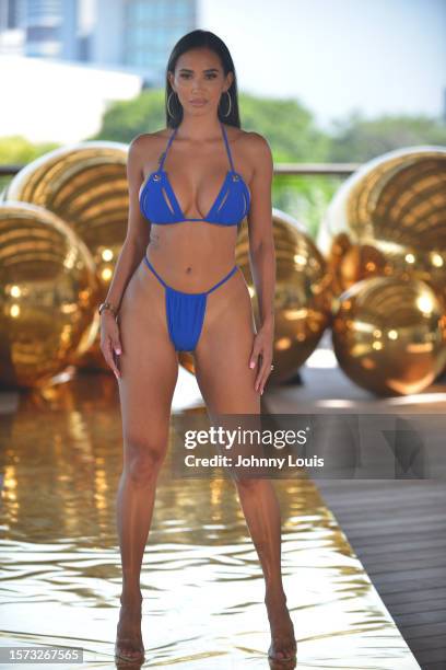 Model walks the runway for Hotmiamistyles during Flying Solo Miami Swim & Resort Show at Pérez Art Museum on July 12, 2023 in Miami, Florida.