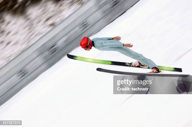 ski jumper in action - ski jump stock pictures, royalty-free photos & images