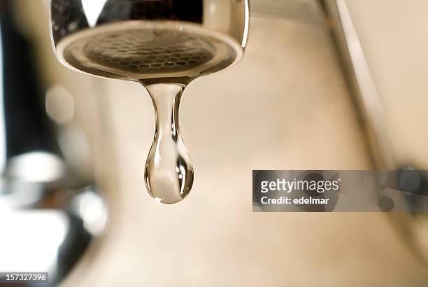 drip goes the faucet - faucet stockfoto's en -beelden