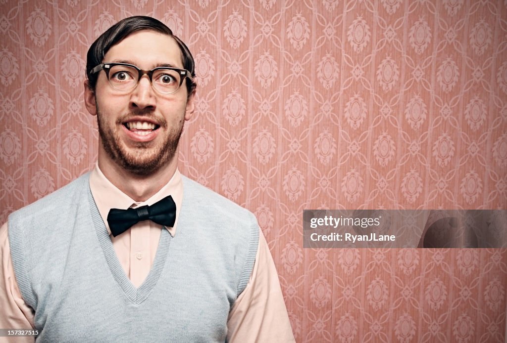 Nerd Student With Retro Glasses and Pink Wallpaper