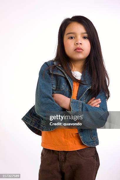 adorable mixed asian hispanic girl crossing arms looking tough - girl standing crossed arms studio stock pictures, royalty-free photos & images