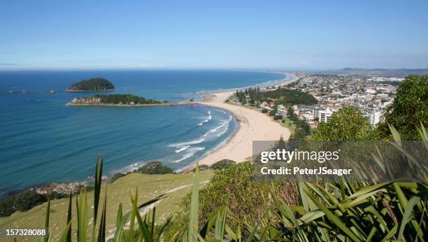 main beach, mount maunganui - mount maunganui stock pictures, royalty-free photos & images