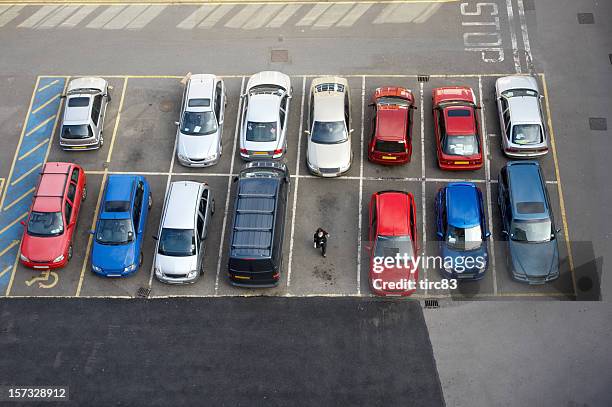 car park and woman - reverse stock pictures, royalty-free photos & images