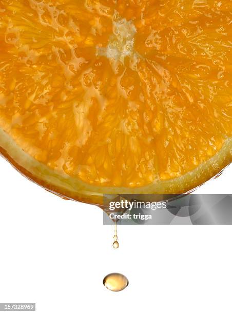 orange orangensaft - saftig stock-fotos und bilder