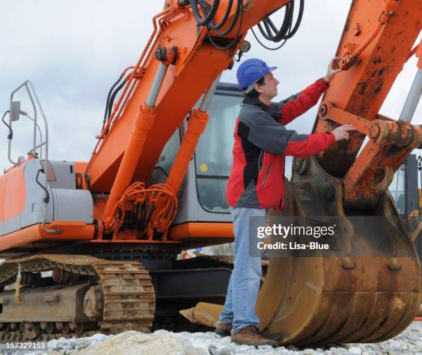 bulldozer mechanic - construction equipment stock pictures, royalty-free photos & images