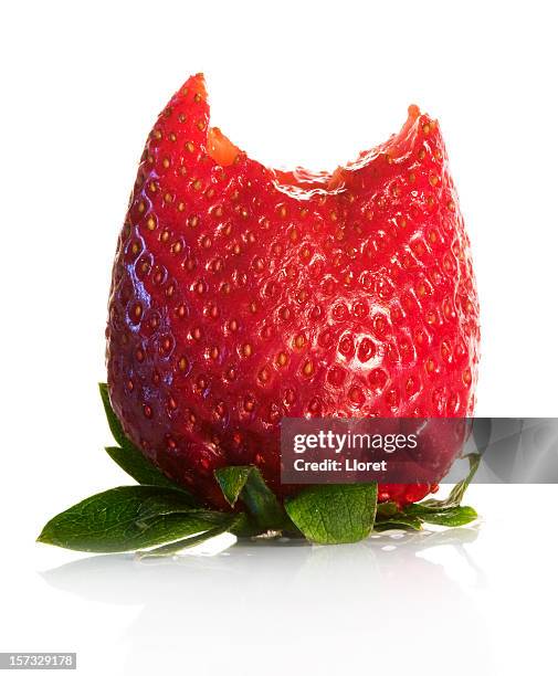 strawberry with one bite - bite mark stock pictures, royalty-free photos & images