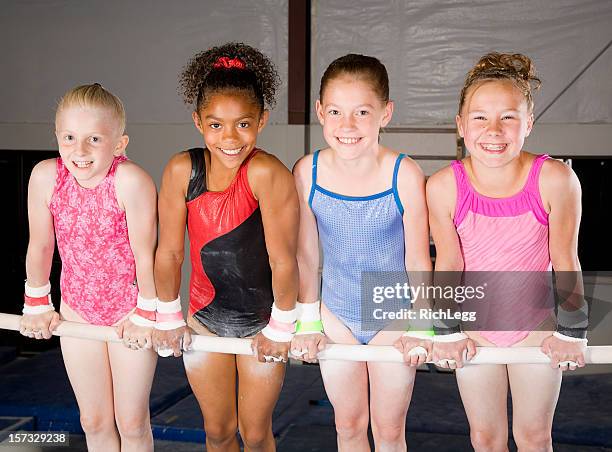 young women gymnasts in a gym - gymnastics stockfoto's en -beelden