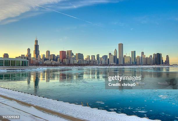winter view of the chicago skyline - aon center chicago stock pictures, royalty-free photos & images