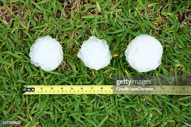 baseball-größe hailstones - hagelschauer stock-fotos und bilder