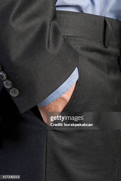 businessman's hand in pocket - man hands in pockets stock pictures, royalty-free photos & images