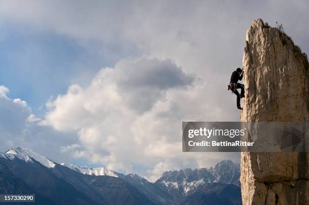 climber - cliff climbing stock pictures, royalty-free photos & images