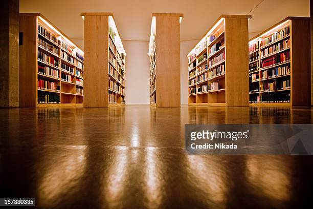 bookshelves at the library - contemporary literature stock pictures, royalty-free photos & images