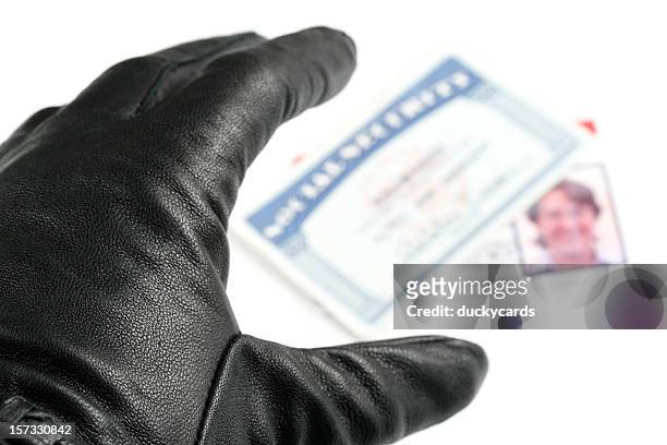 identity theft - black glove stock pictures, royalty-free photos & images