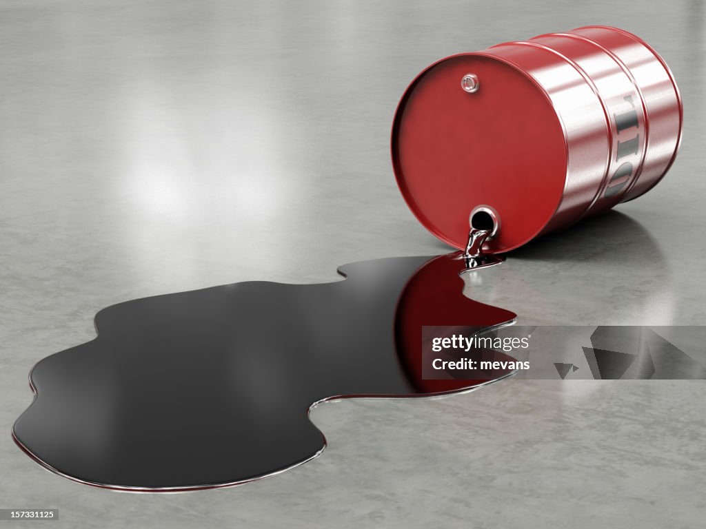 Oil spilling from red barrel onto floor