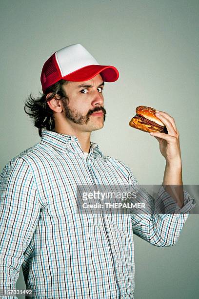 me and my burger - trucker hat stock pictures, royalty-free photos & images