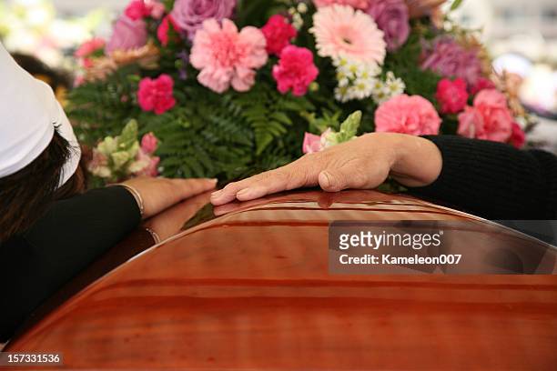 at the funeral (burial) - funeral flowers stockfoto's en -beelden