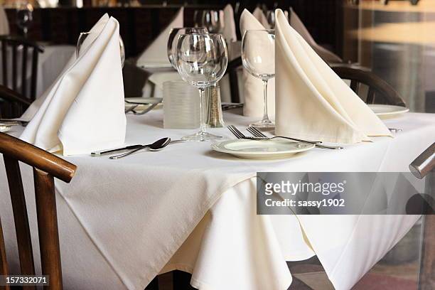 restaurant table setting linens glasses silverware - napkin stock pictures, royalty-free photos & images