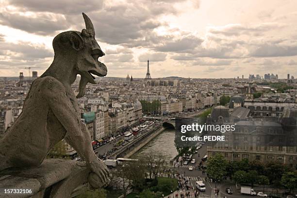 gargoyle over paris (notre dame) - notre dame de paris stock pictures, royalty-free photos & images