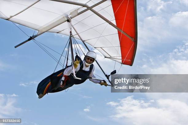 hang gliding flying overhead, closeup. - hang glider stock pictures, royalty-free photos & images