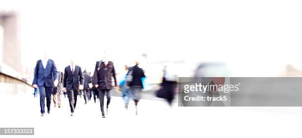 rush hour: high key blurred commuters business abstract - portrait blurred background stockfoto's en -beelden