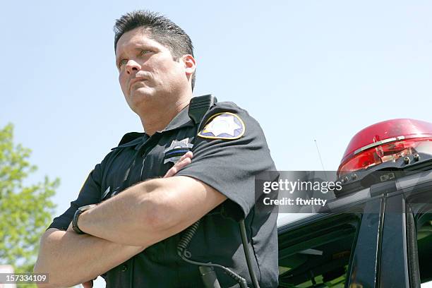 police officer arms folded - police siren stock pictures, royalty-free photos & images