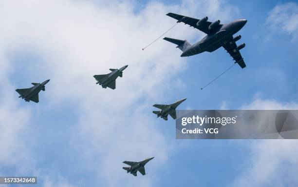Yunyou-20A, or YY-20A, aerial refueling aircraft, two J-20 stealth fighter jets and two J-16 fighter jets perform during the 2023 Changchun Air Show...