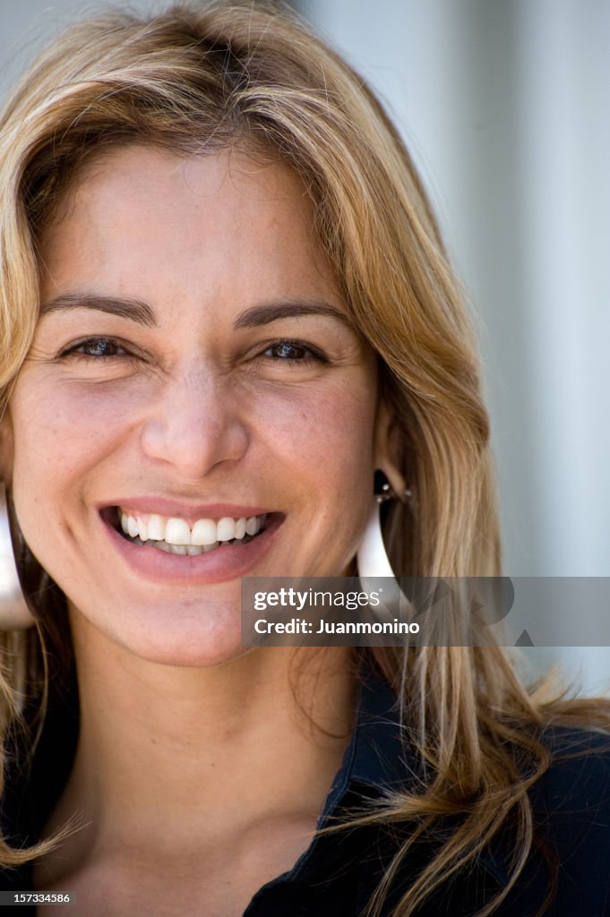 Face of a Smiling Hispanic Woman (no make up)