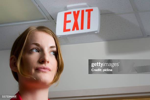 time to leave? - exit sign stock pictures, royalty-free photos & images