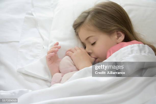 ciuccio - pollice parte del corpo foto e immagini stock