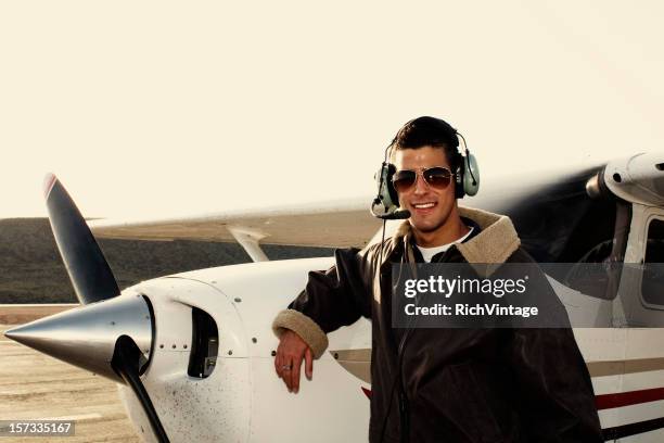 young male pilot - propeller airplane stock pictures, royalty-free photos & images