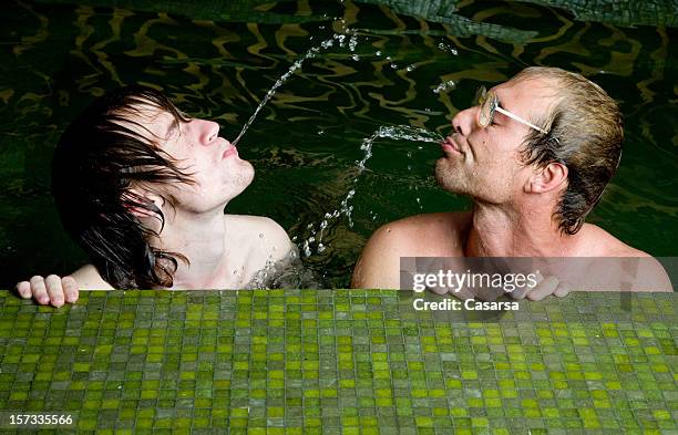 boys in the pool - spats stock pictures, royalty-free photos & images