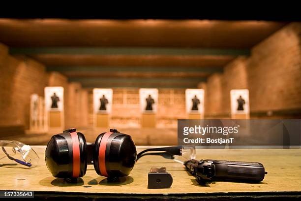 shooting range - pistol stock pictures, royalty-free photos & images