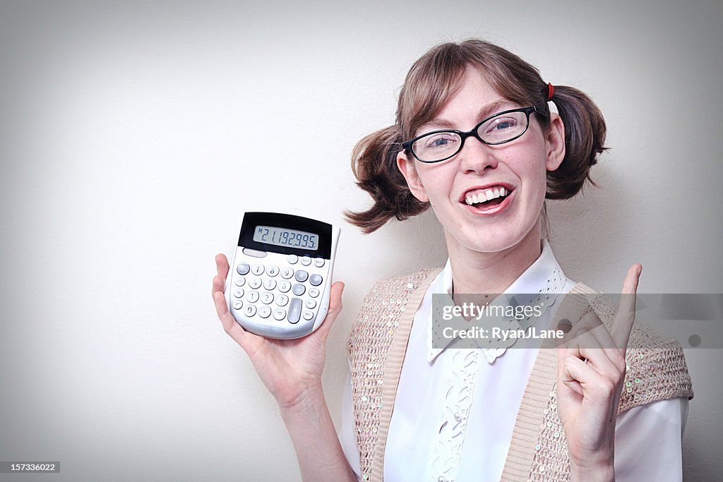 Nerd Girl With Calculator and Copy Space