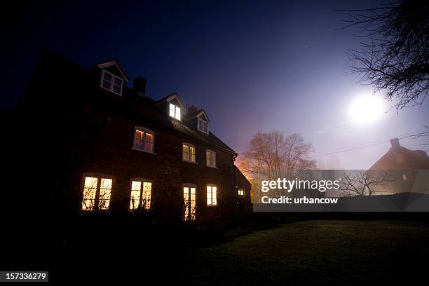 house at night - british culture garden stock pictures, royalty-free photos & images