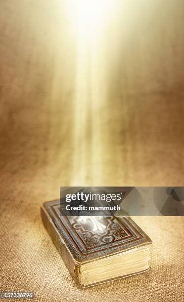 holy book in divine light - holy spirit pentecost stock pictures, royalty-free photos & images
