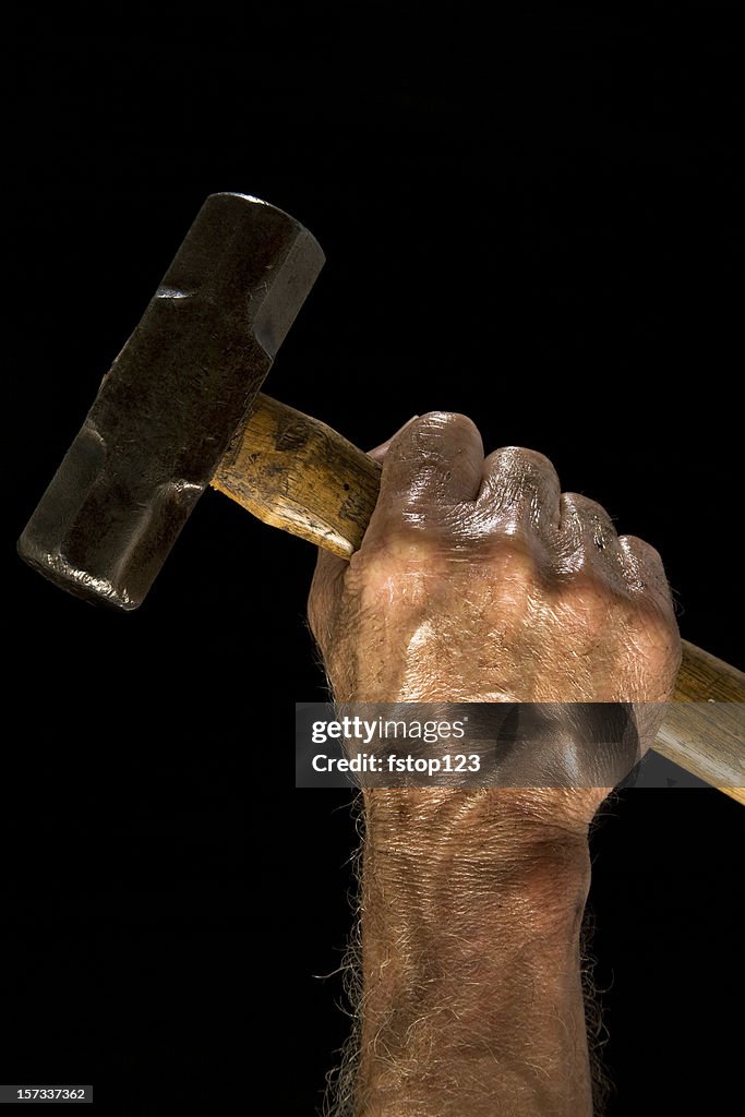 Mann mit dem Vorschlaghammer. Dirty, Braunflecken -. Arbeiterklasse. Hand.