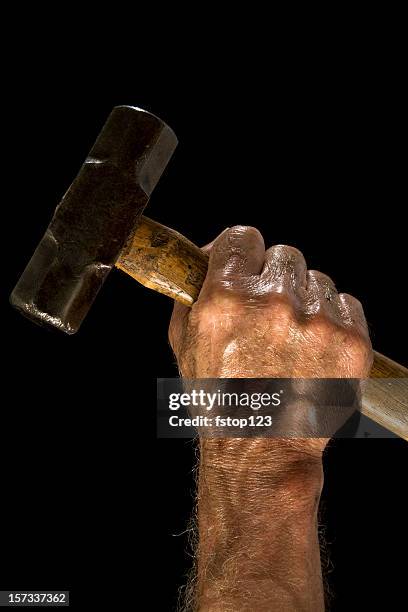 man with sledgehammer. dirty, greasy. working class. hand. - sledgehammer stockfoto's en -beelden