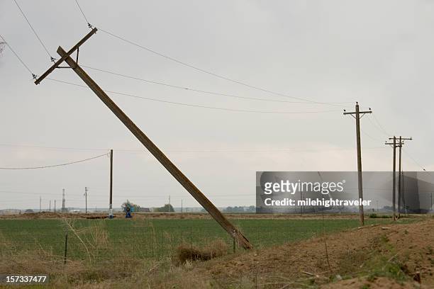 tornado twisted and snapped power lines greeley colorado - greeley colorado stock pictures, royalty-free photos & images