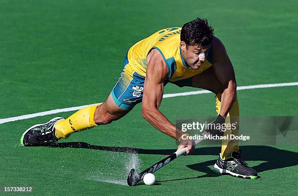 Chris Ciriello of Australia hits the ball during the match between Australia and the Netherlands during day two of the Champions Trophy on December...