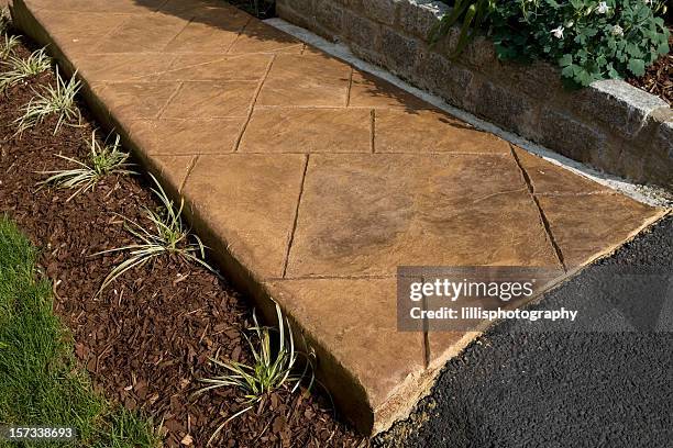 stamped concrete sidewalk - pedestrian walkway stock pictures, royalty-free photos & images