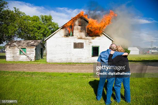 couple's house on fire - inferno stock pictures, royalty-free photos & images